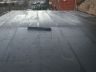 Flat roof base layer installed