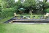 Garden Pond with Black Limestone patio